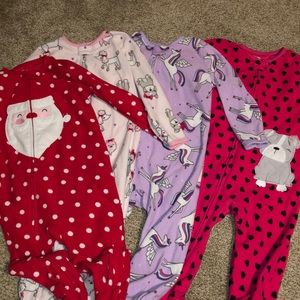 Four pairs of 2T fleece footie pajamas